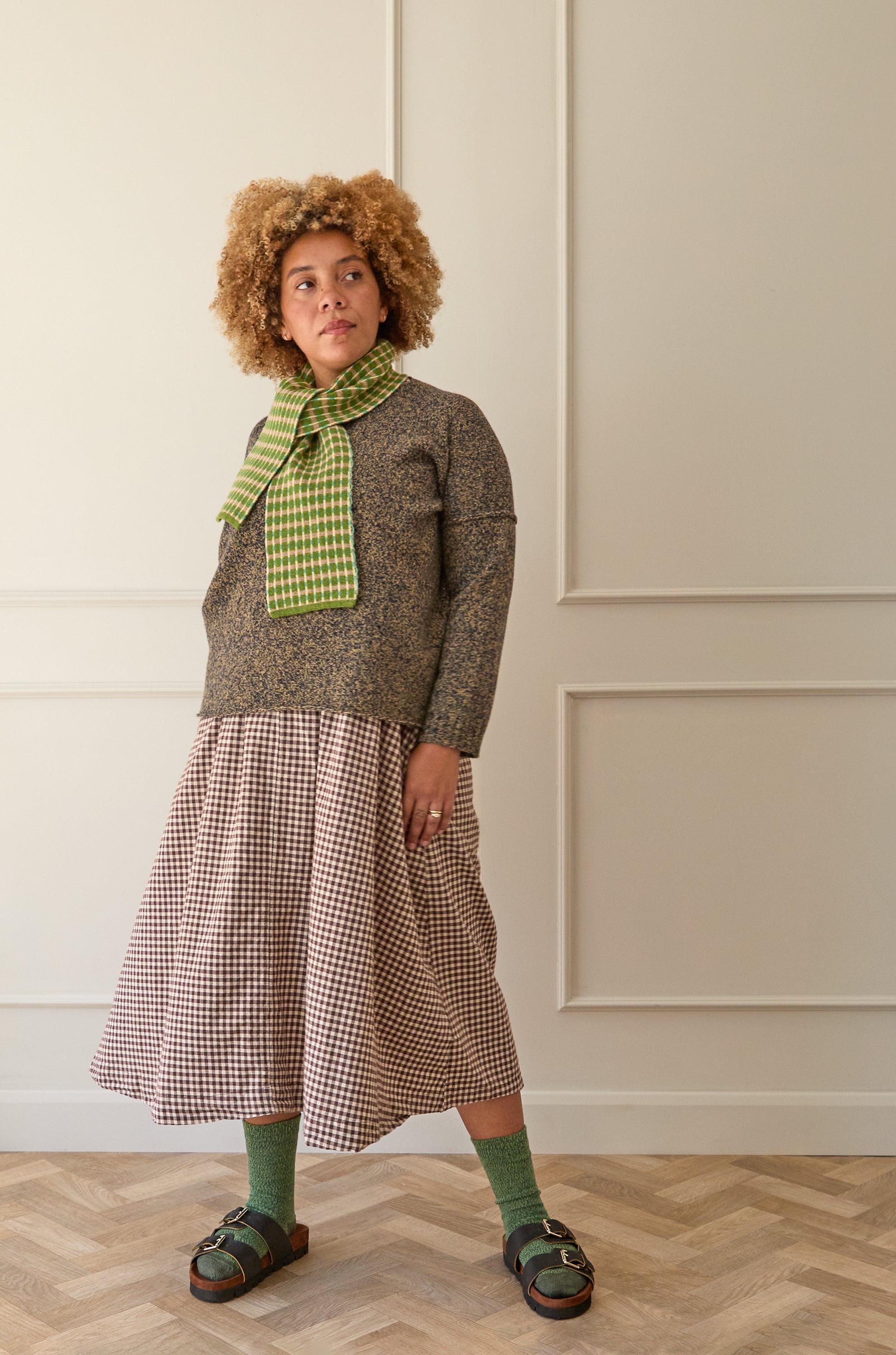Model wearing green merino wool socks, with Birkenstock sandals. Designed and made in Britain.