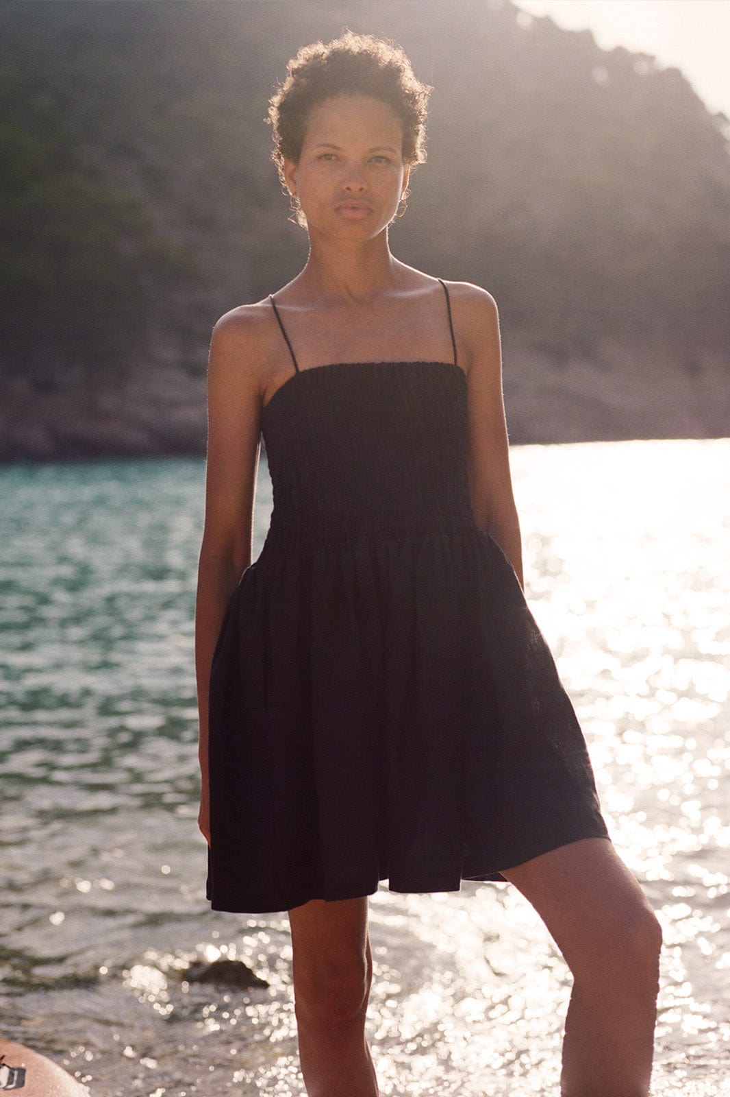 The Harlow Smocked Mini Dress in black