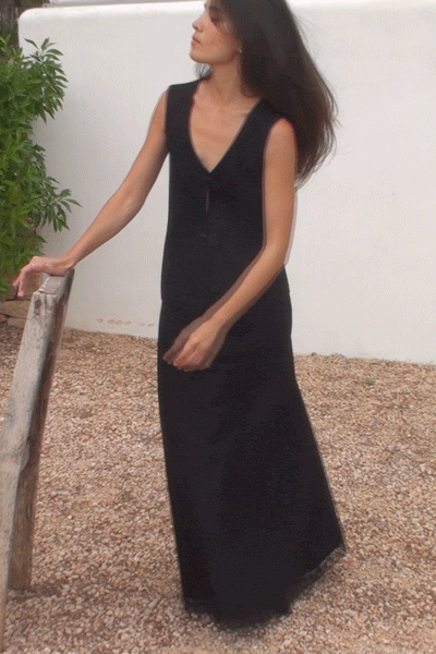 The Marie Sleeveless Wool Vest in black with lace trim