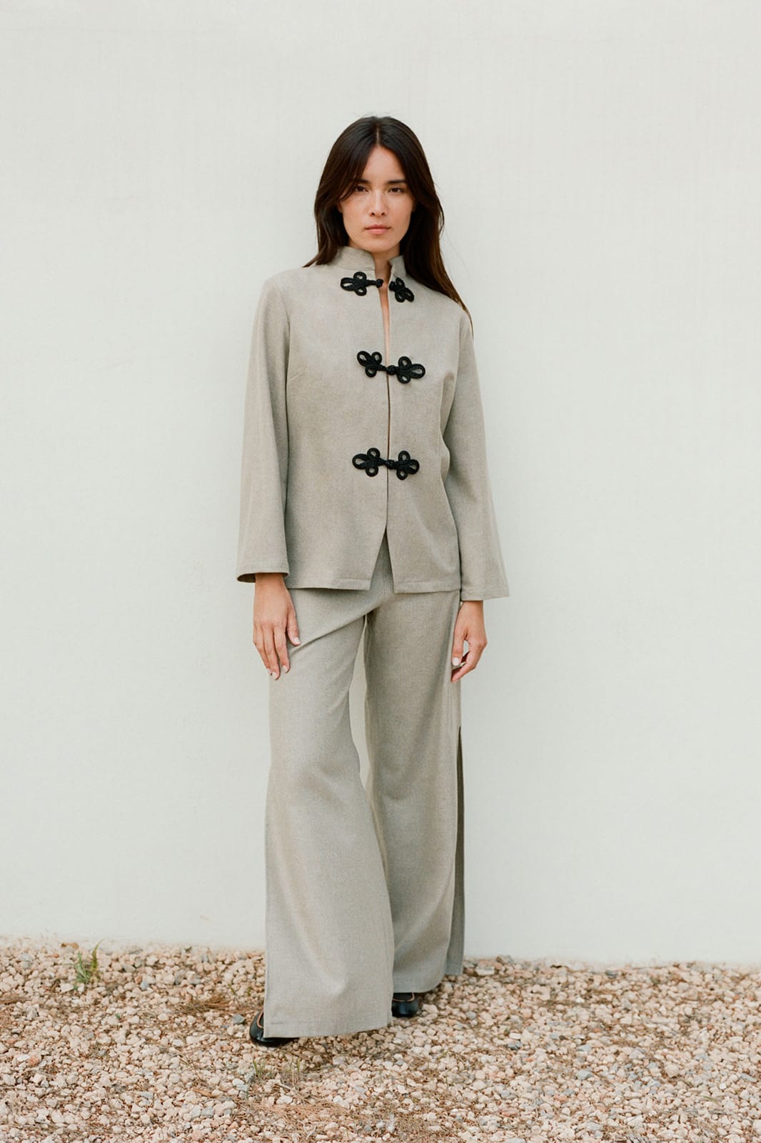 The Lena Wide-Leg Wool Trousers with side slit in beige