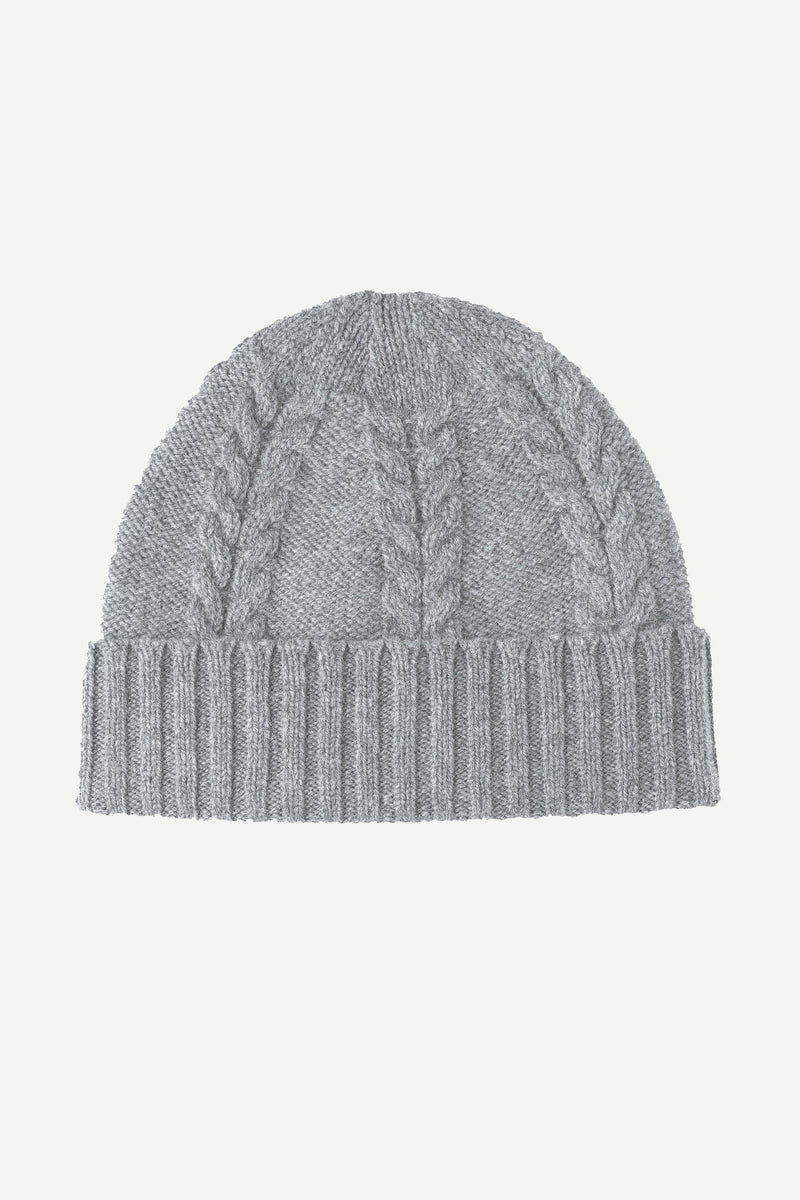 Ciaran beanie is expertly crafted in Scotland from 100% pure lambswool. The Ciaran beanie is designed with engineered cables and contrast rib trim. Sustainable pure wool essentials. 100% pure lambs wool. Made in Scotland.