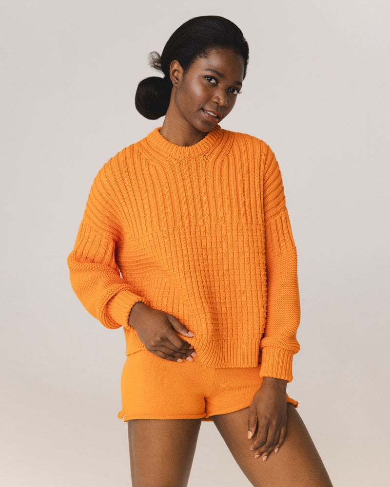 Delčia: Orange Cotton Sweater