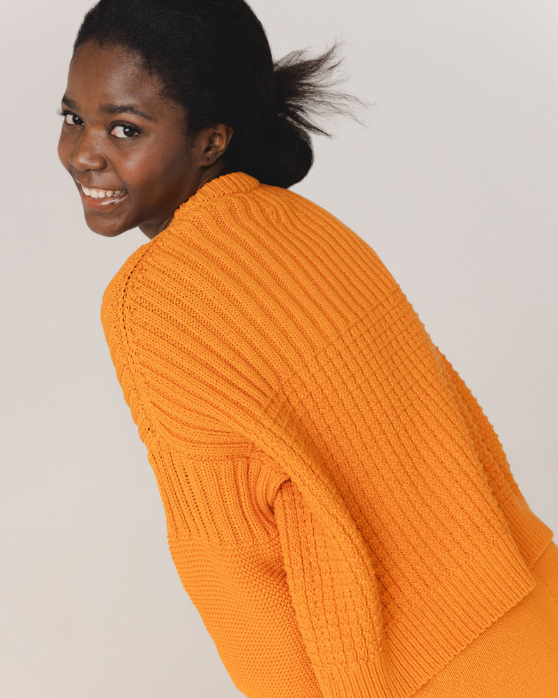 Delčia: Orange Cotton Sweater