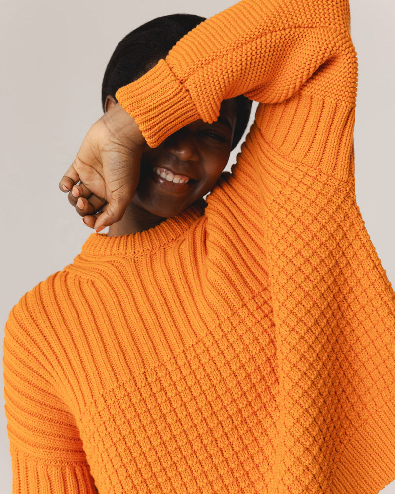 Delčia: Orange Cotton Sweater