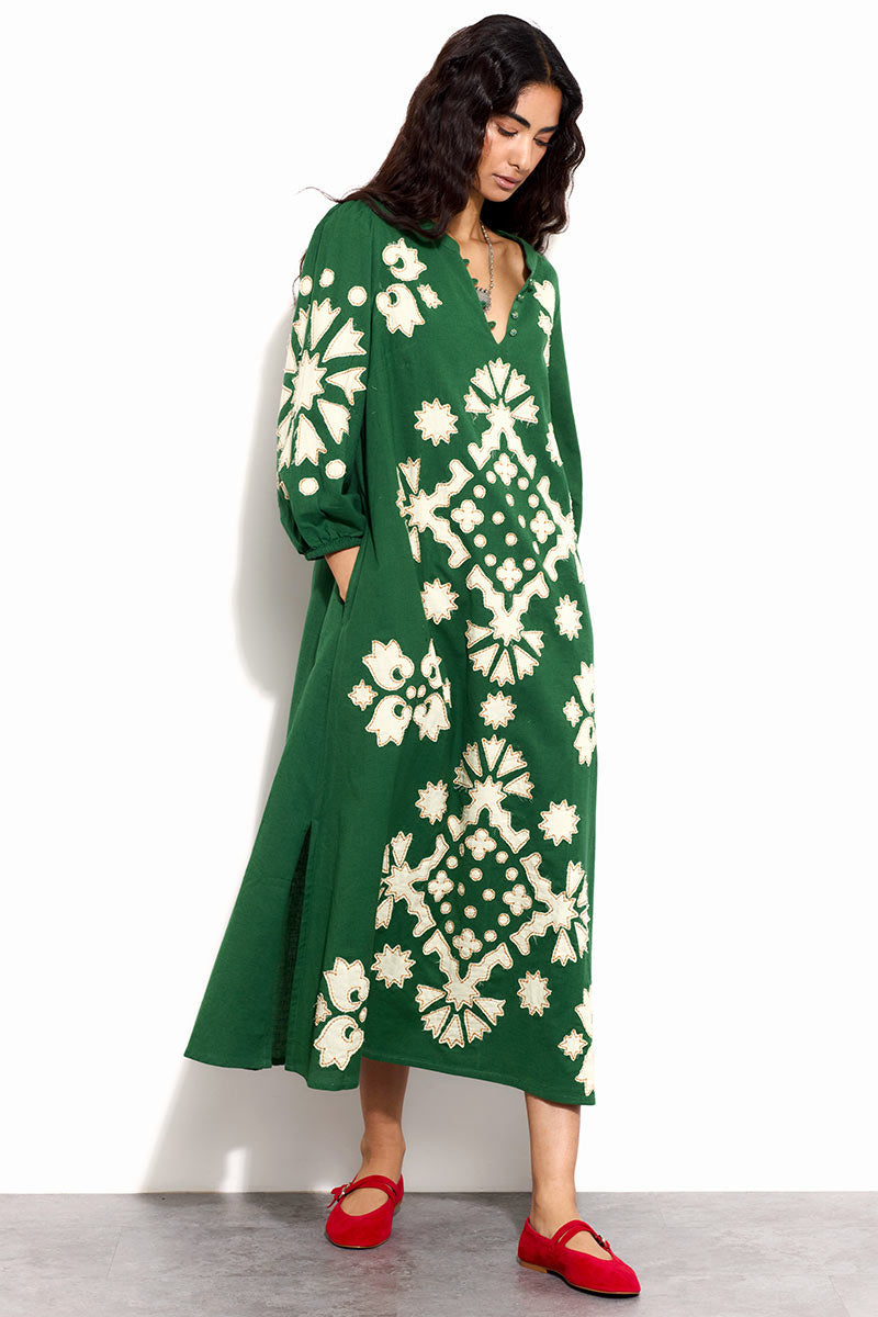 Model wears EAST Jill Green Applique Dress