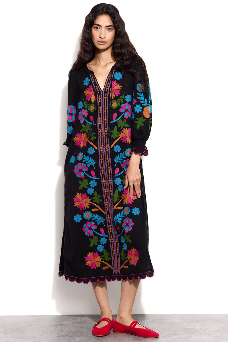 Model wears East Keoni Embroidered Dress