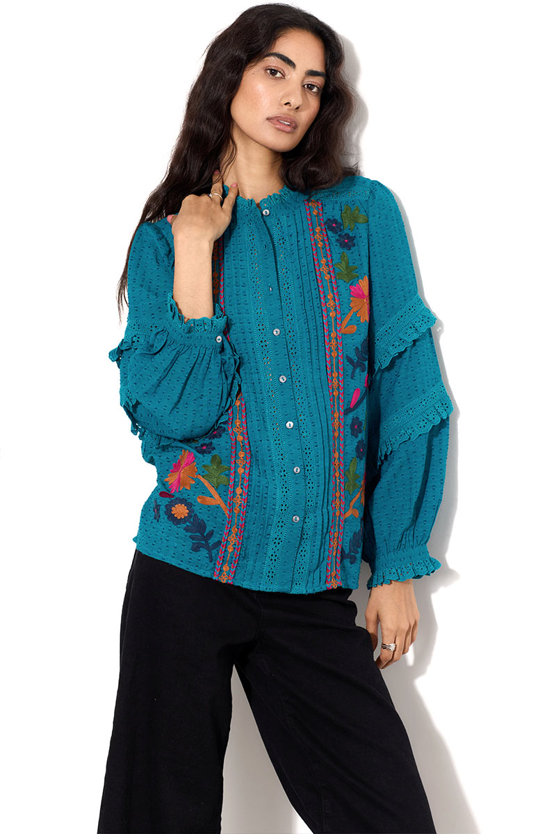 Model wears East Keoni Blue Embroidered Blouse.