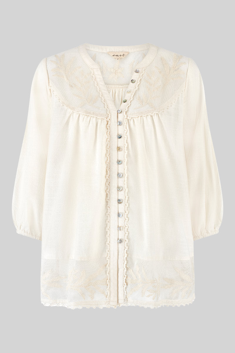 Front shot. EAST Theia Ivory Embroidered Mesh button through Top 