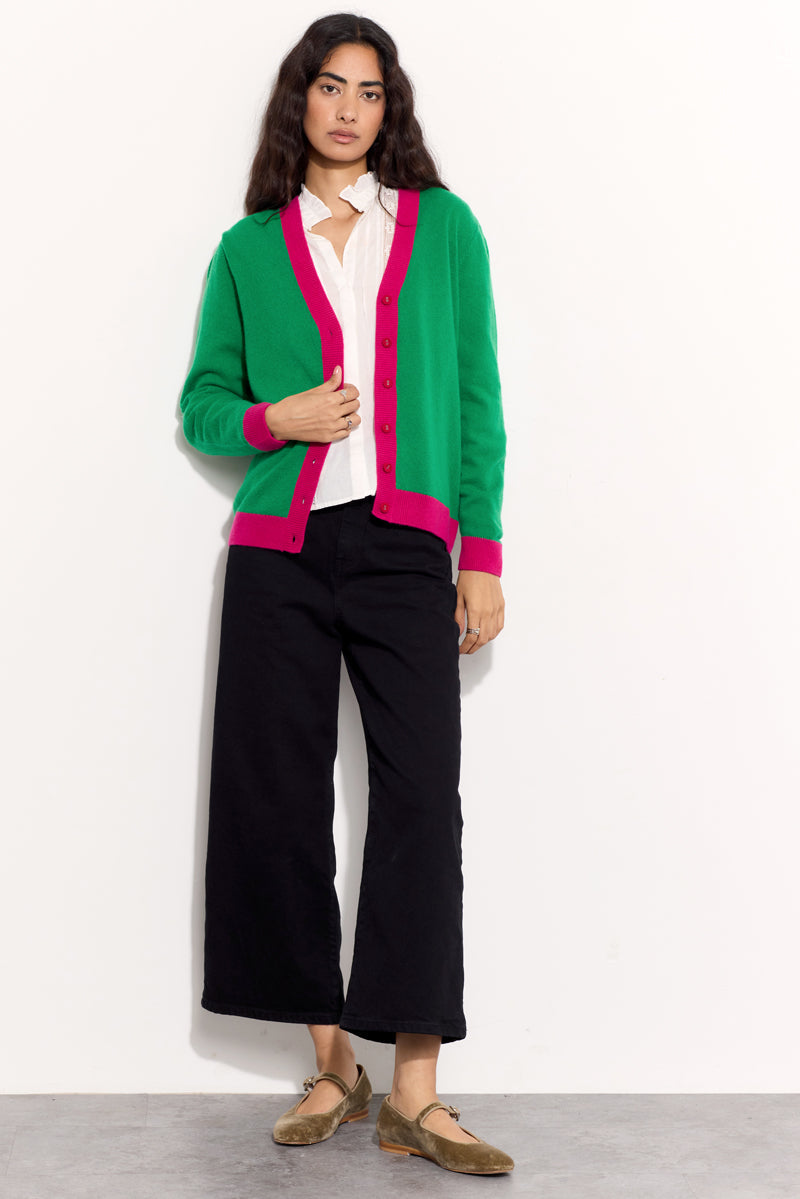 Model wears EAST Kally Green and Pink Cashmere Button Cardigan