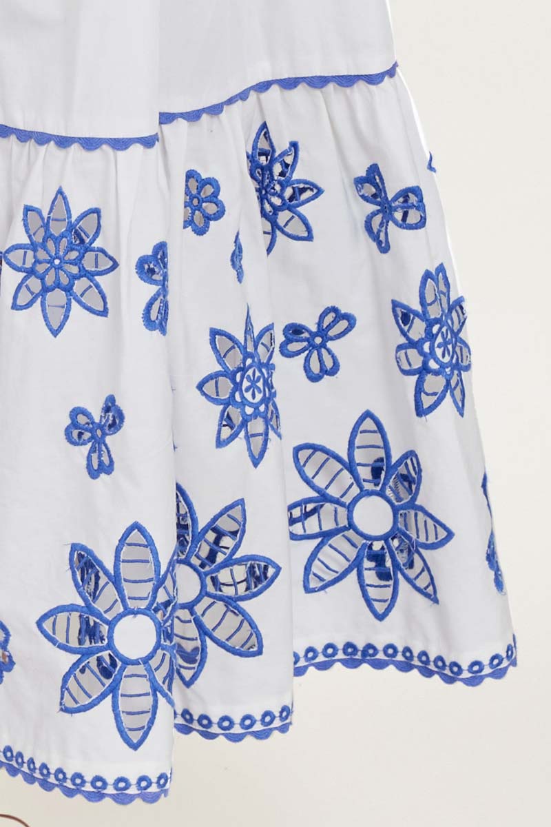 Close up of embroidery work on the East Heritage Harlow White Organic Cotton Embroidered Dress