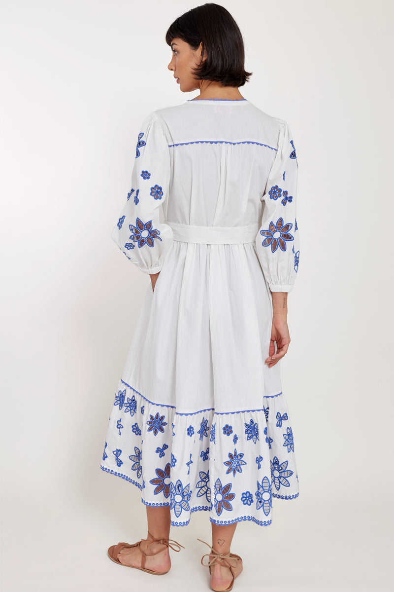 Back view of model wearing East Heritage Harlow White Organic Cotton Embroidered Dress
