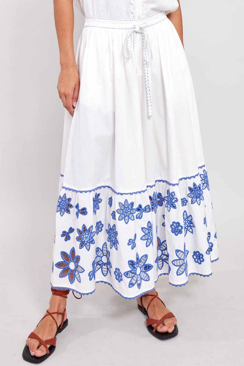 Close up front view of model wearing East Heritage Harlow White Organic Cotton Skirt