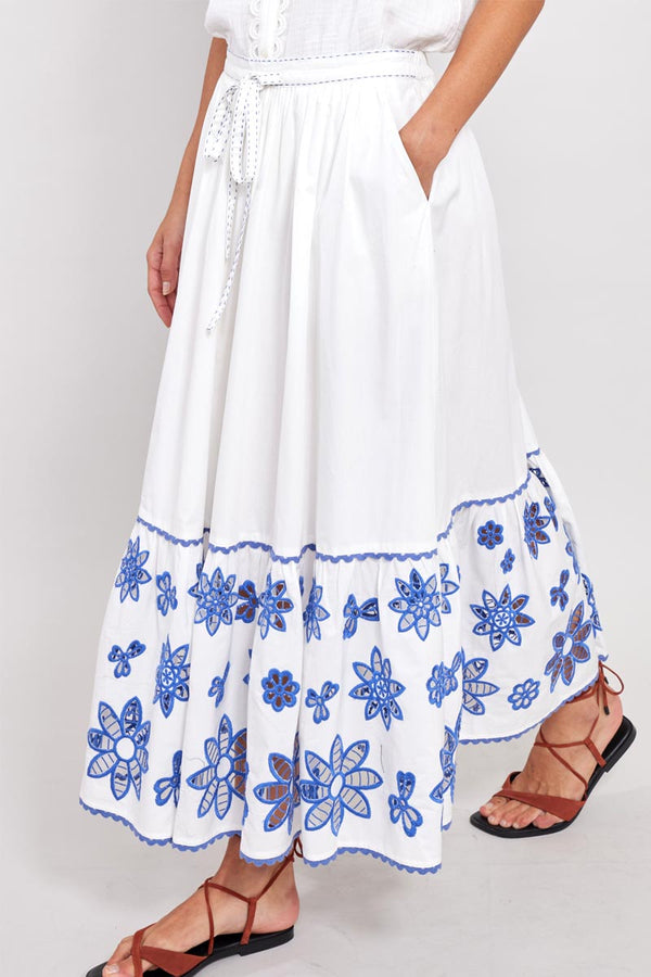 Close up of model wearing East Heritage Harlow White Organic Cotton Skirt