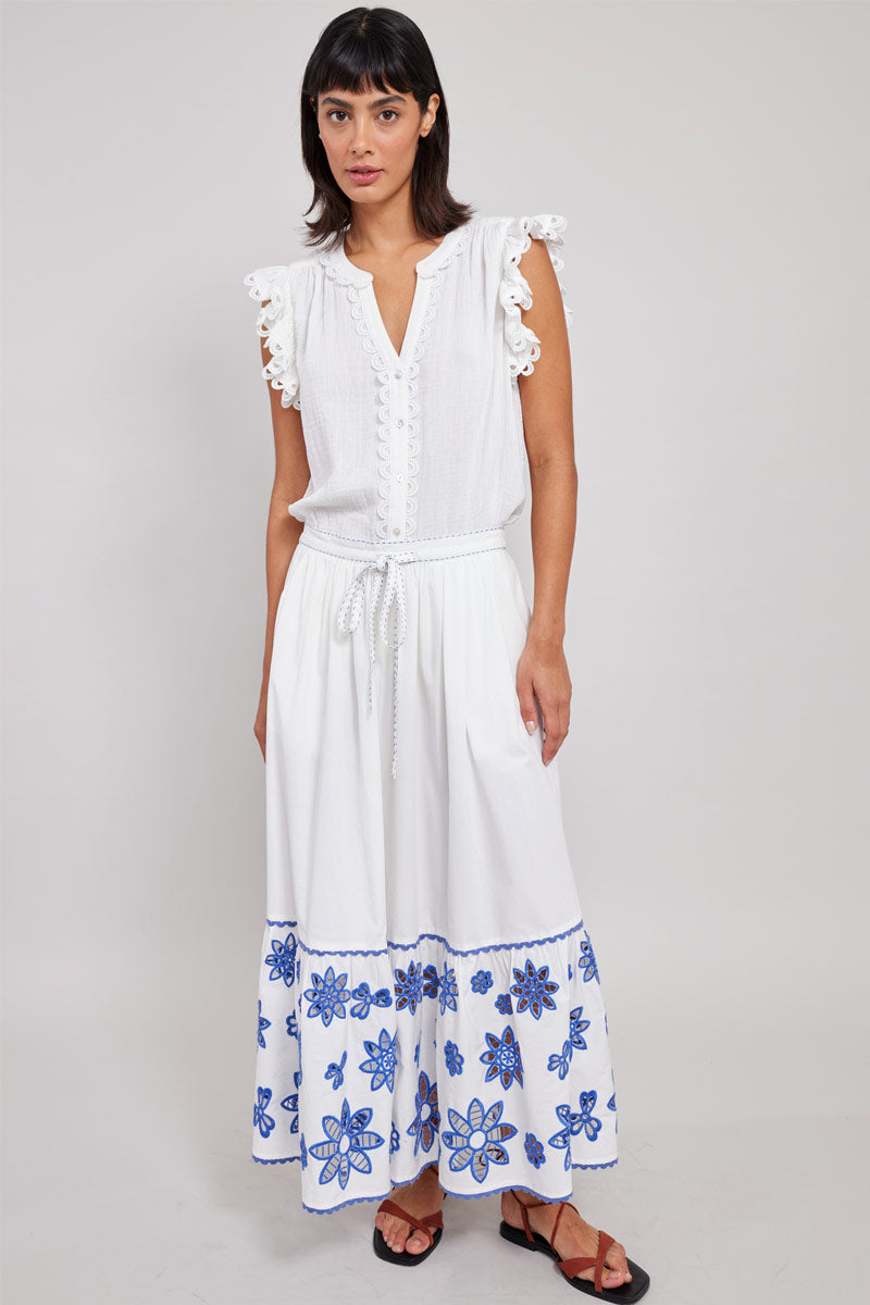 Front view of model wearing East Heritage Harlow White Organic Cotton Skirt