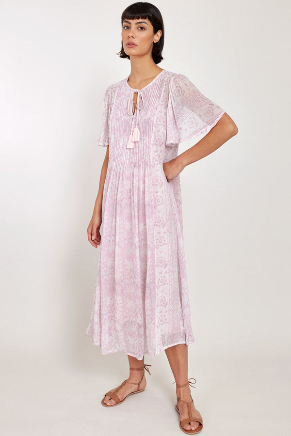 Model wears East Heritage Luana Powder Pink Dress