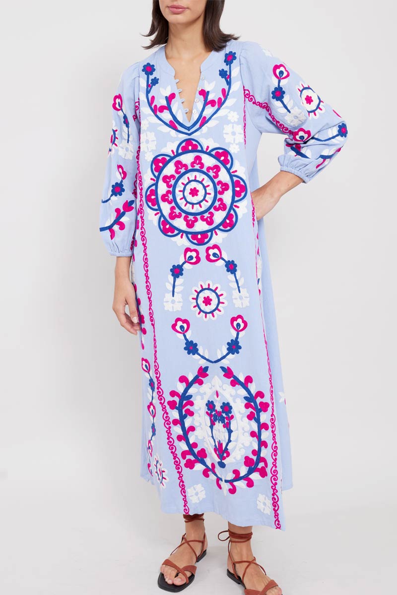 Model wears East Dora Embroidered Dress