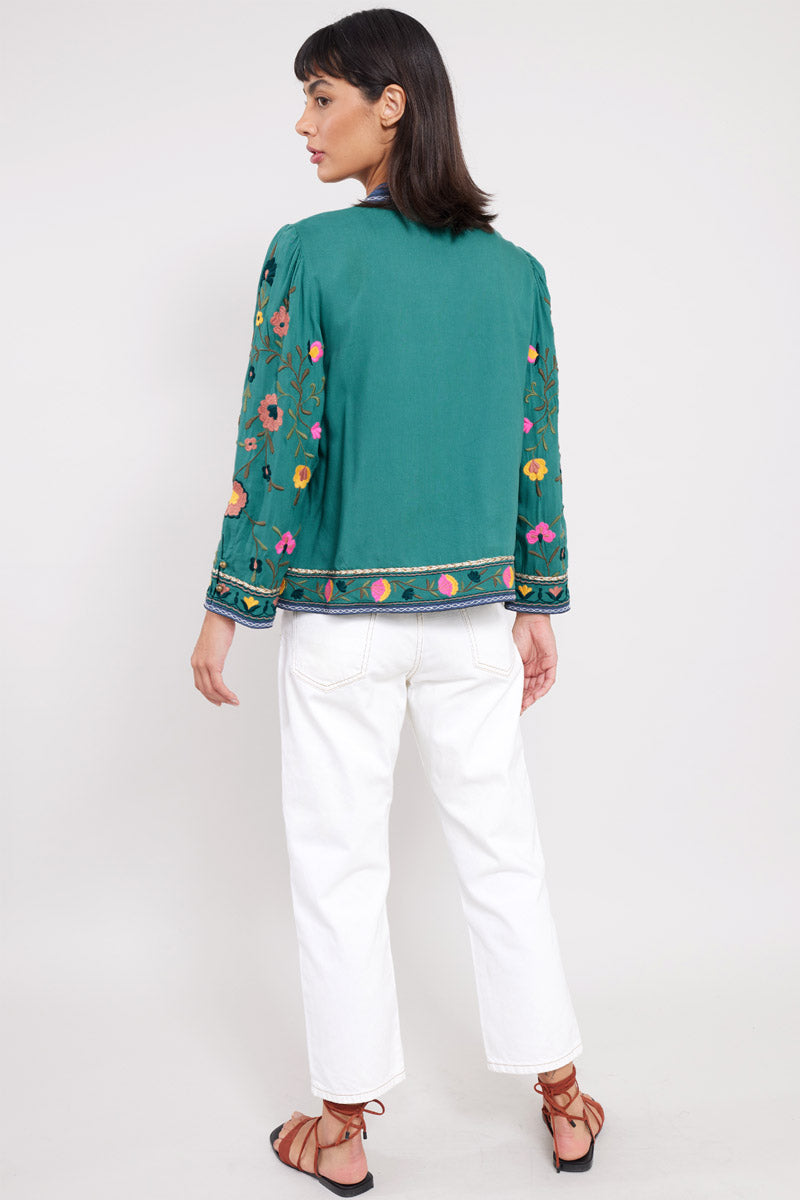 Back view of model wearing East Eve Emerald Embroidered Jacket
