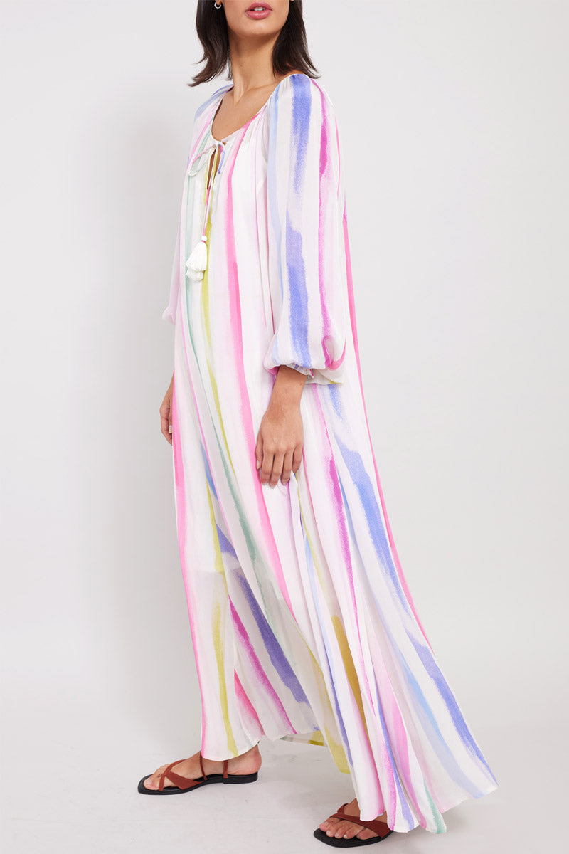 Side view of model wearing East Kandi Rainbow Dress