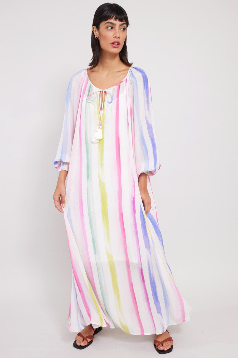 Model wearing East Kandi Rainbow Dress