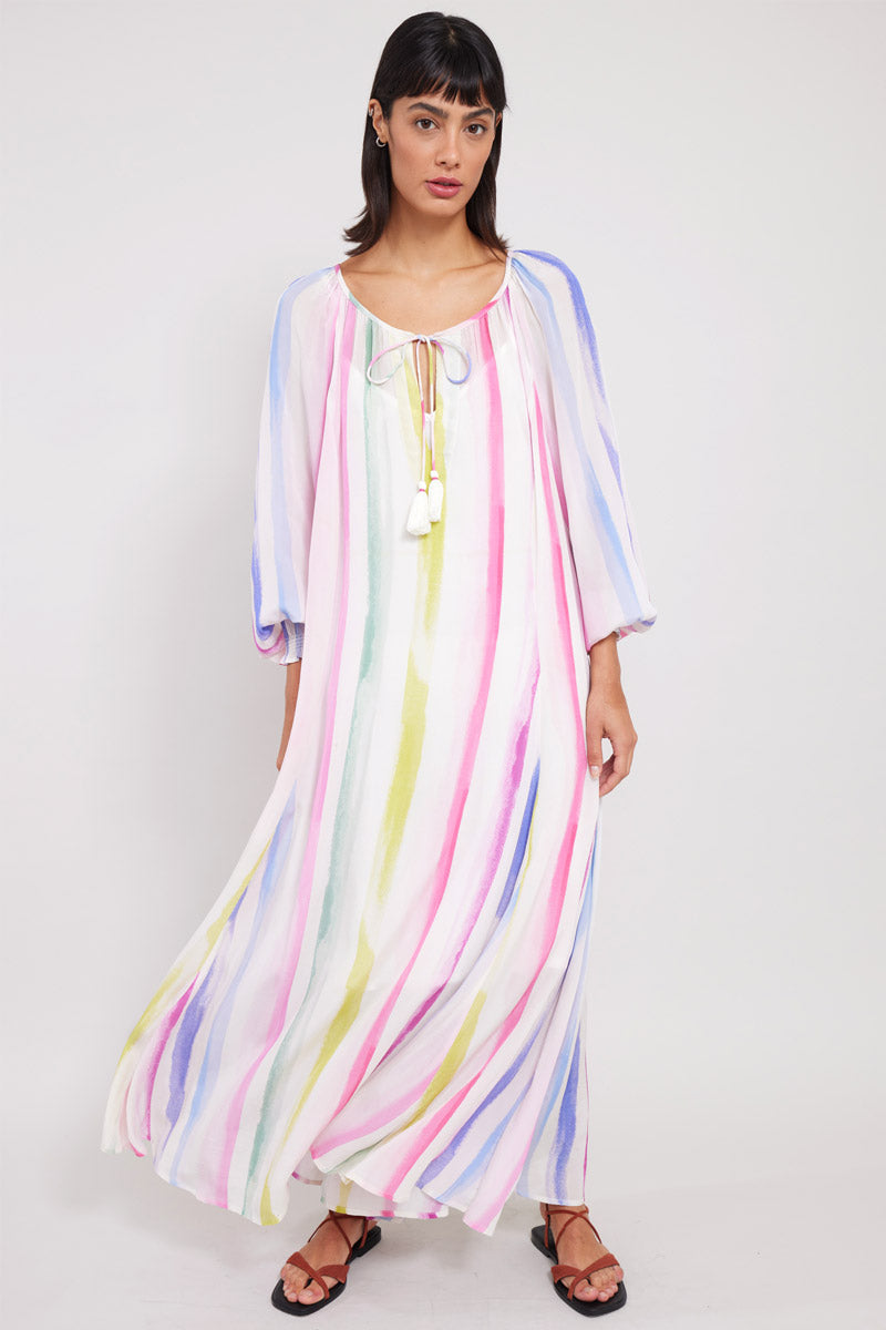 Model wearing East Kandi Rainbow Dress