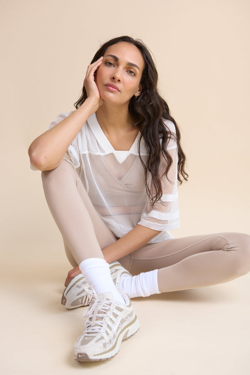HRMN8 Women's beige Sculpt Leggings and Slip Wrap bra set, full-length, buttery-soft with contour seams, medium support for workouts or athleisure.