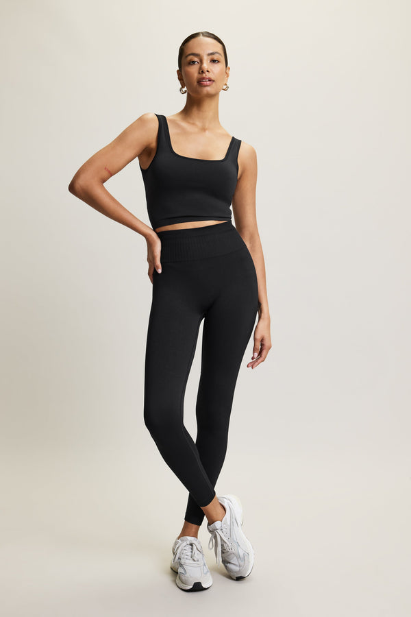 Discover our premium Jilla Active black Presence leggings crafted from strong, supportive fabric for ultimate comfort and durability. Featuring a wide, secure waistband with extra elastic for stability during yoga and Pilates, these leggings move with you. The stylish ribbed paneling provides flexibility and gentle compression, making them perfect for both workouts and casual outings. Elevate your activewear collection by pairing them with the matching top for a coordinated look.