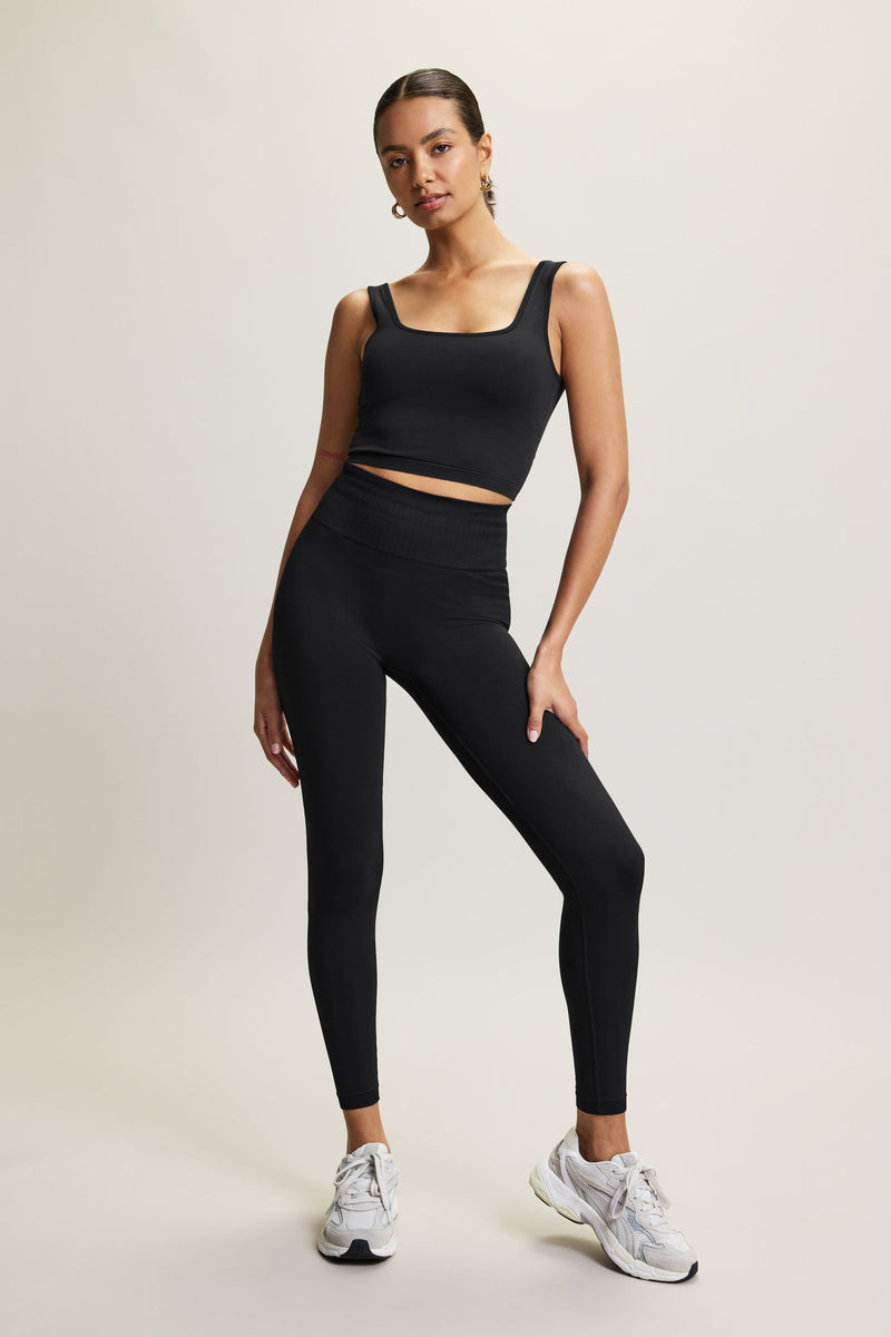 Discover our premium Jilla Active black Presence leggings crafted from strong, supportive fabric for ultimate comfort and durability. Featuring a wide, secure waistband with extra elastic for stability during yoga and Pilates, these leggings move with you. The stylish ribbed paneling provides flexibility and gentle compression, making them perfect for both workouts and casual outings. Elevate your activewear collection by pairing them with the matching top for a coordinated look.