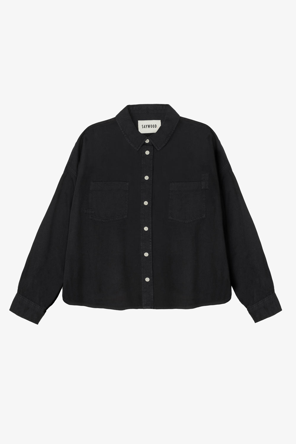 Women's black Japanese denim boxy shirt. Lela Boxy Shirt with patch pockets and natural corozo buttons, by Saywood. Sustainably made in the UK.