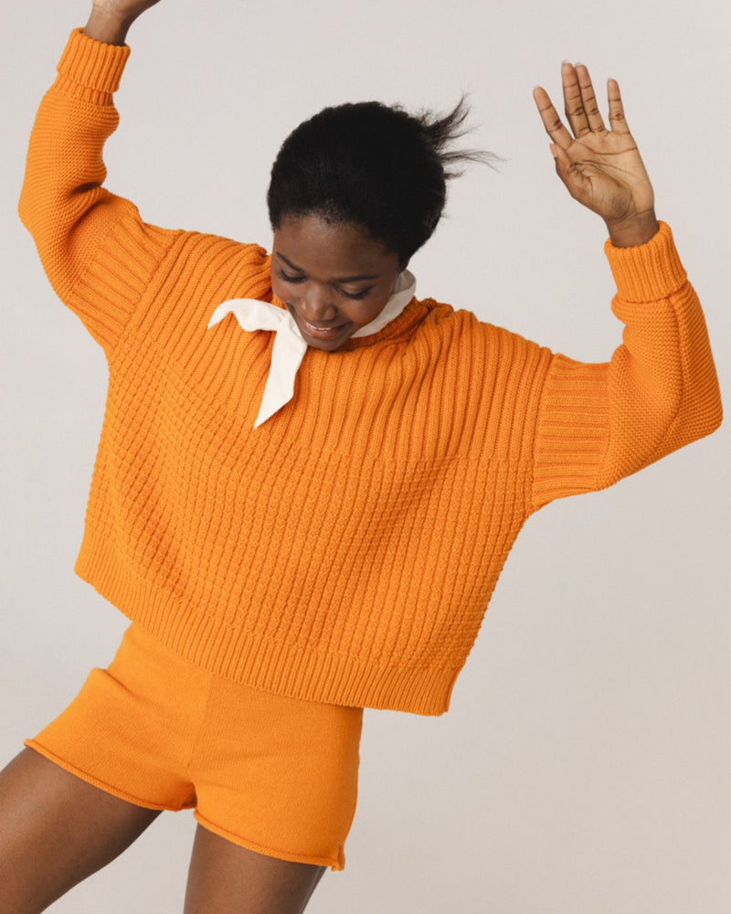 Delčia: Orange Cotton Sweater