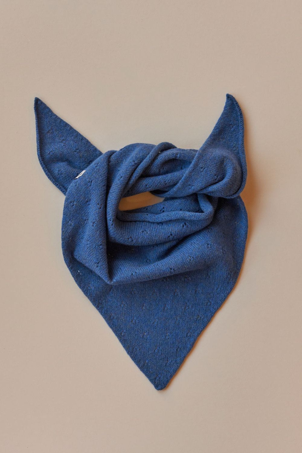 Royal blue lace neckerchief knitted in soft lambswool. designed and made in the UK by Rove.