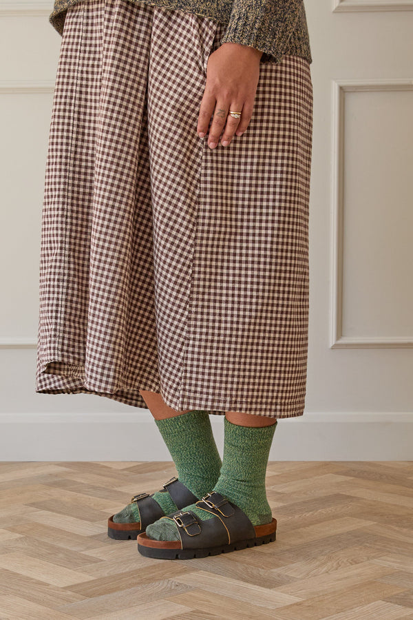 Model wearing green merino wool socks, with Birkenstock sandals. Designed and made in Britain. 