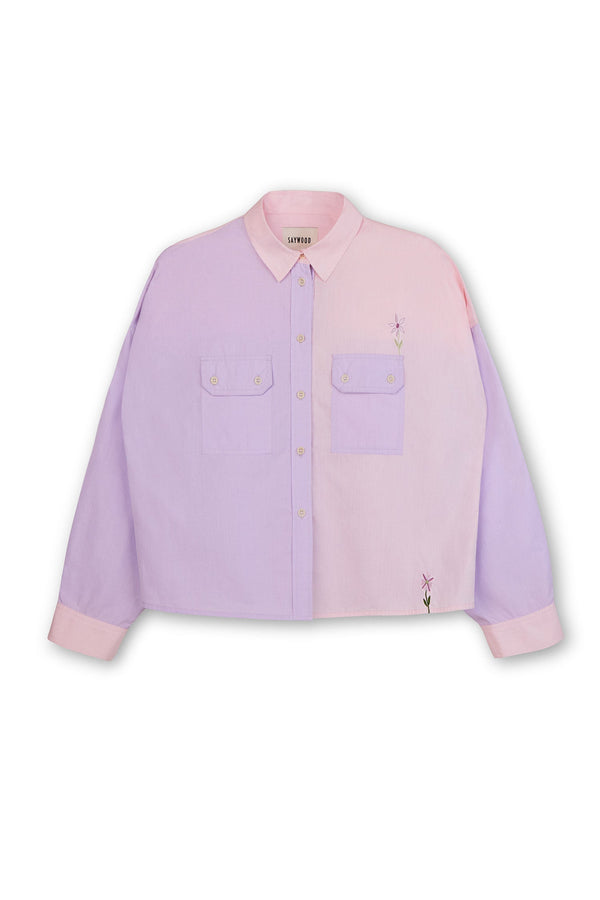 Colourblocked pink and lilac shirt with a boxy silhouette. Jules Shirt from Saywood with embroidered flower detail and utility style pockets.