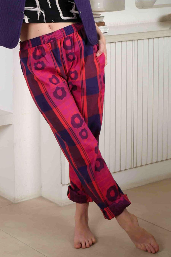 Jacquard woven pink, red, blue and purple trousers by Wild Clouds