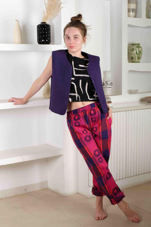 Jacquard woven pink, red, blue and purple trousers by Wild Clouds
