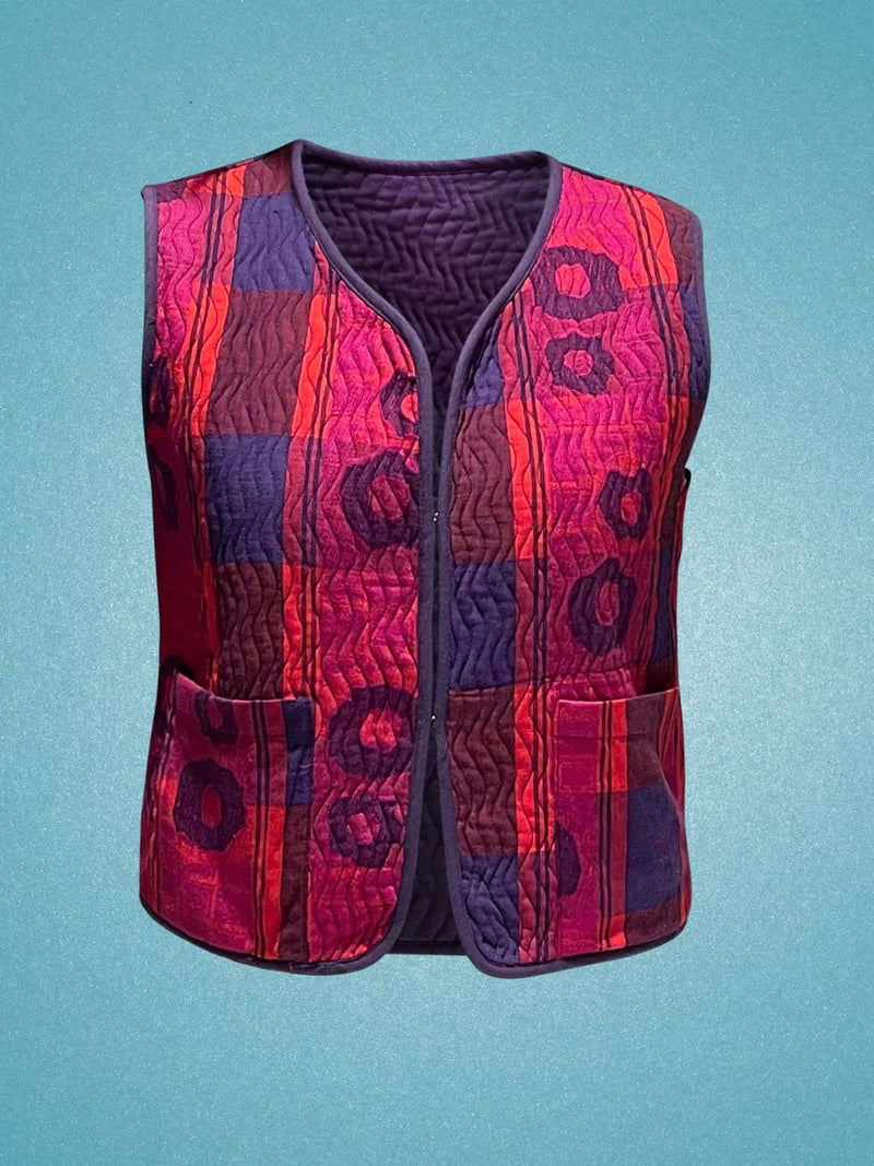 Jacquard woven pink, red, blue and purple quilted gilet vest by Wild Clouds