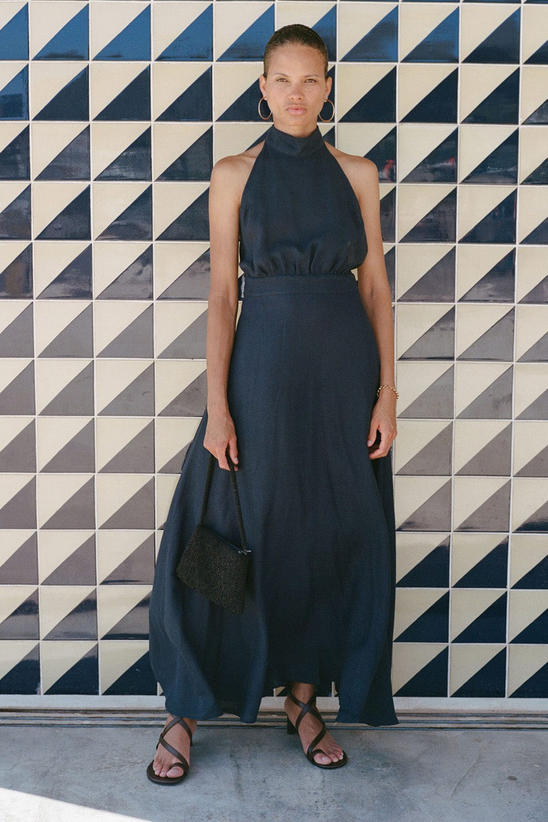 The Isi Halterneck Dress in navy blue The Isi Halterneck Dress in navy blue