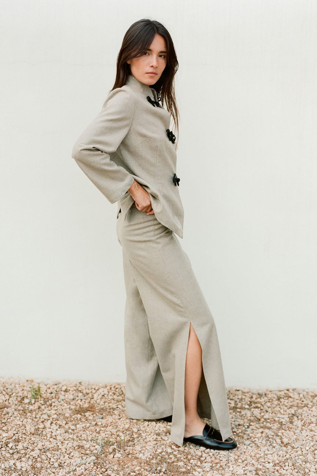 The Lena Wide-Leg Wool Trousers with side slit in beige