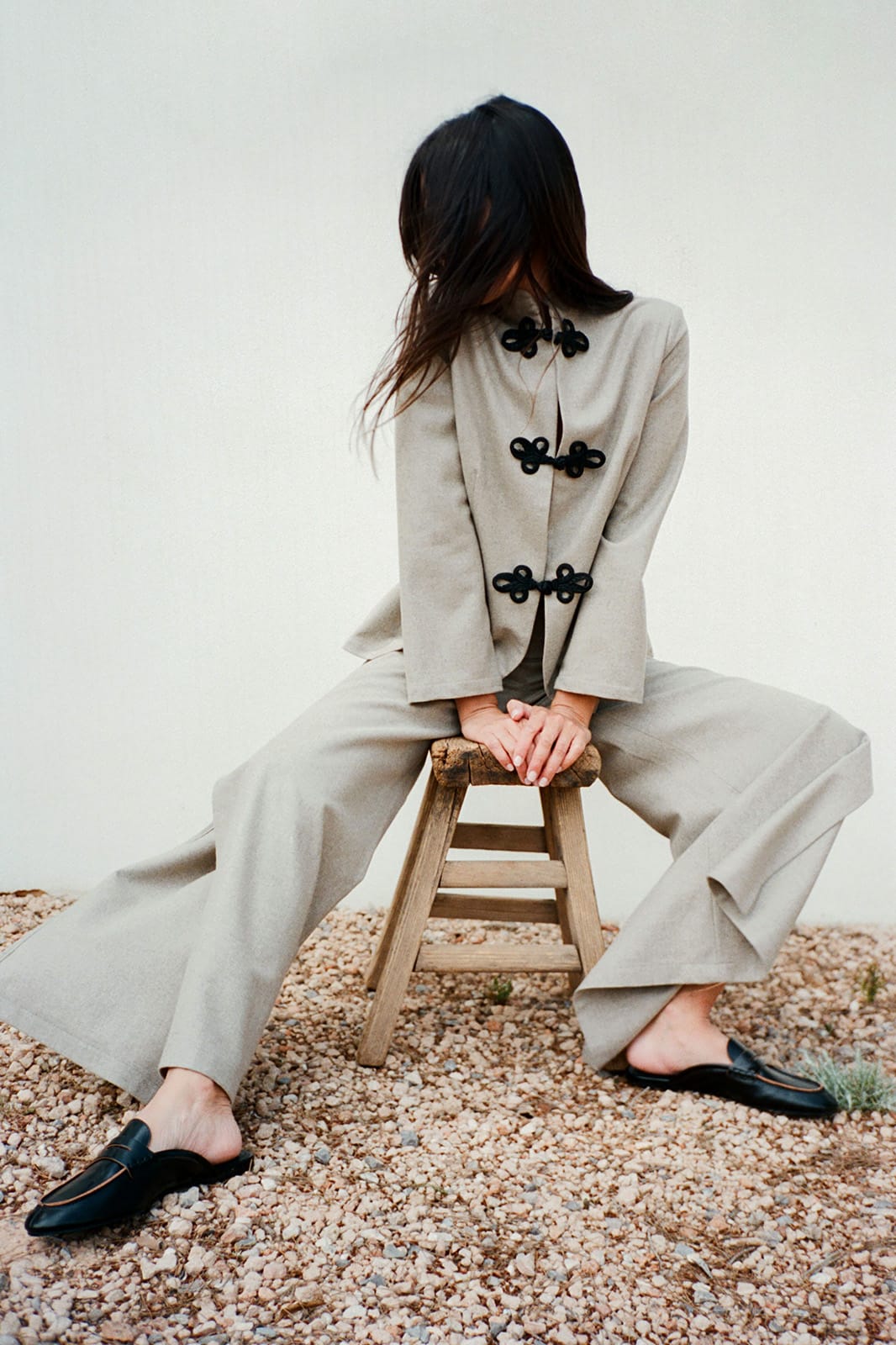 The Lena Wide-Leg Wool Trousers with side slit in beige