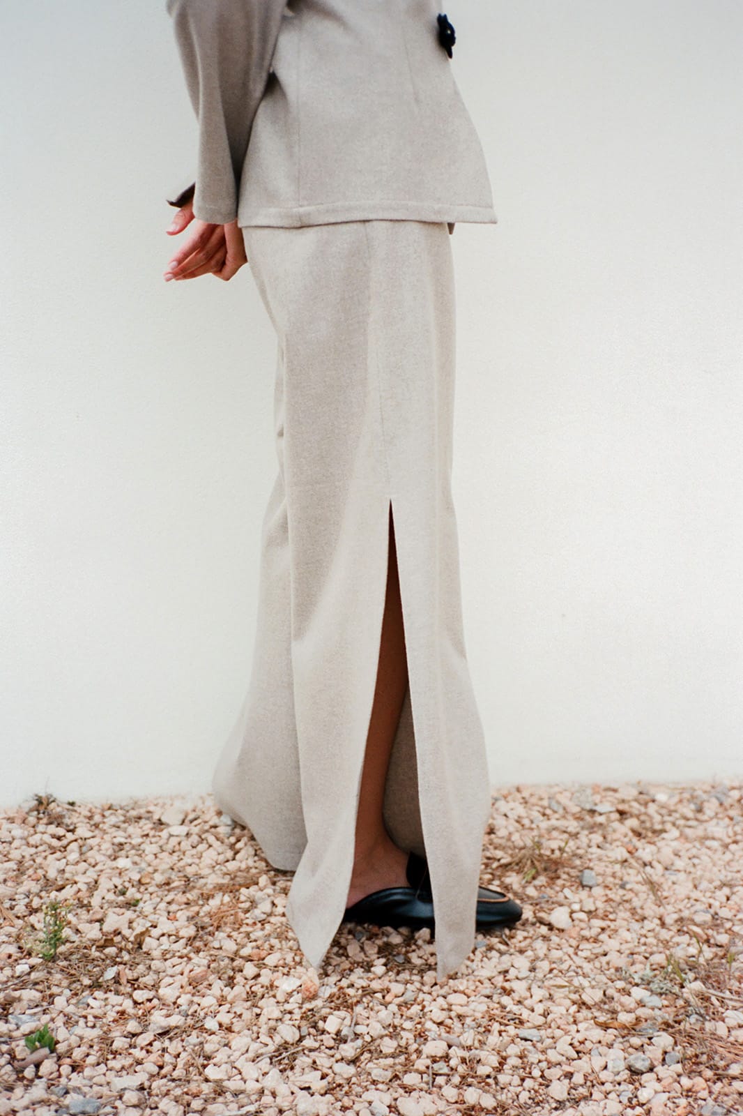 The Lena Wide-Leg Wool Trousers with side slit in beige