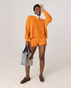 Delčia: Orange Cotton Sweater & Shorts Set
