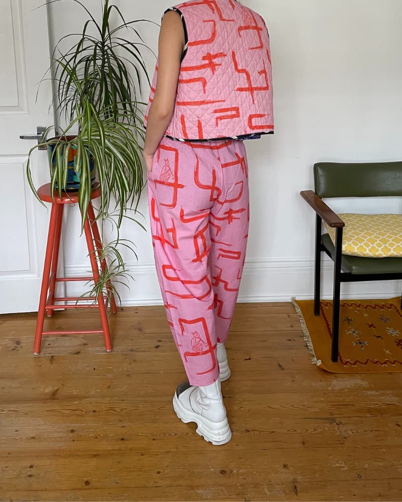 Organic cotton and linen pinik and red balloon trousers by Wild Clouds London