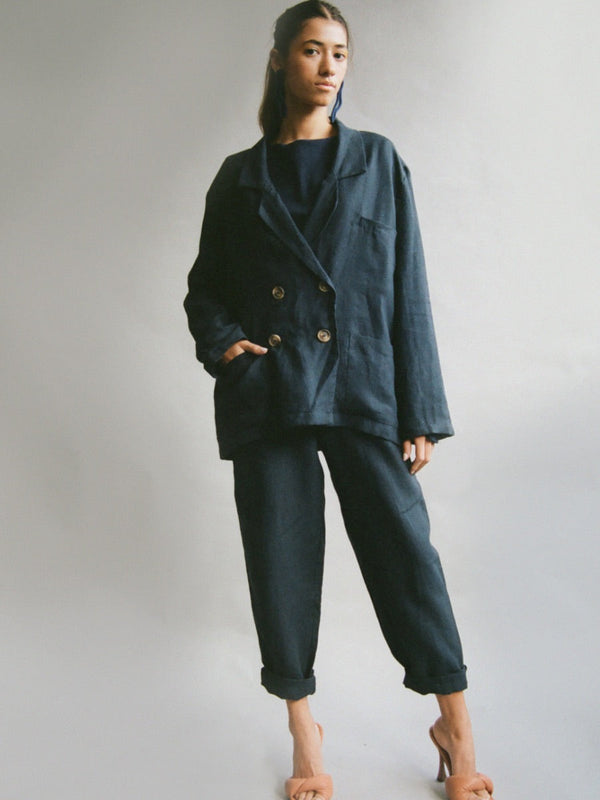 Double breasted Ethically Made Navy Linen Suit with roll up trousers and a high waist. Made by ethical clothing brand Fanfare Label