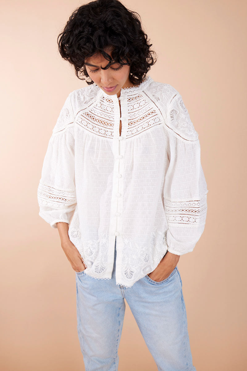 Model wearing Juliette White Cotton Embroidered Blouse by East.co.uk