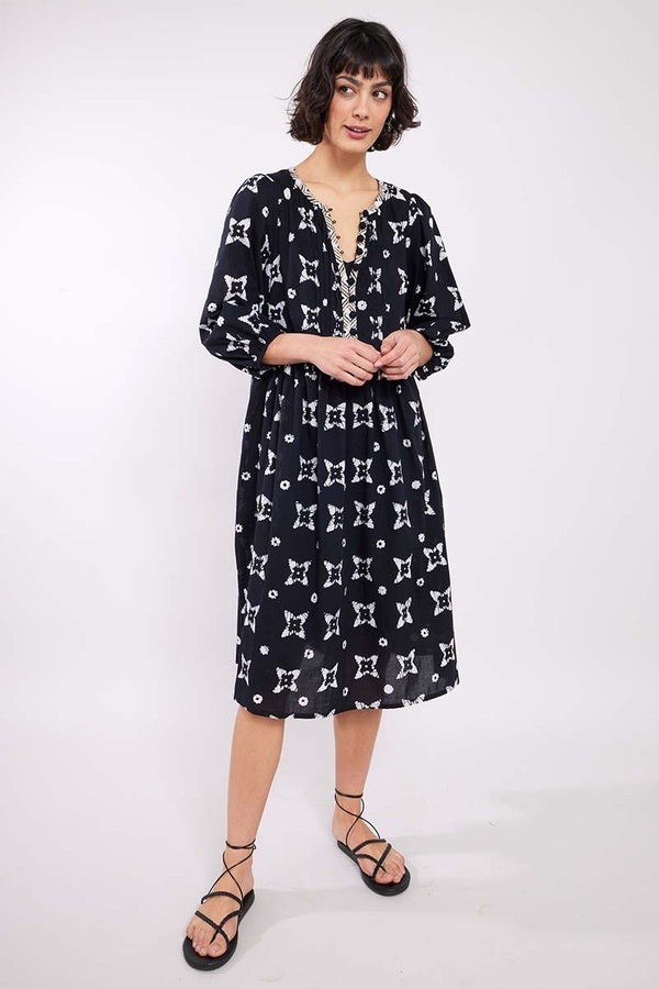 Model wearing Nimbus Black Organic Cotton Batik Dress by East.co.uk