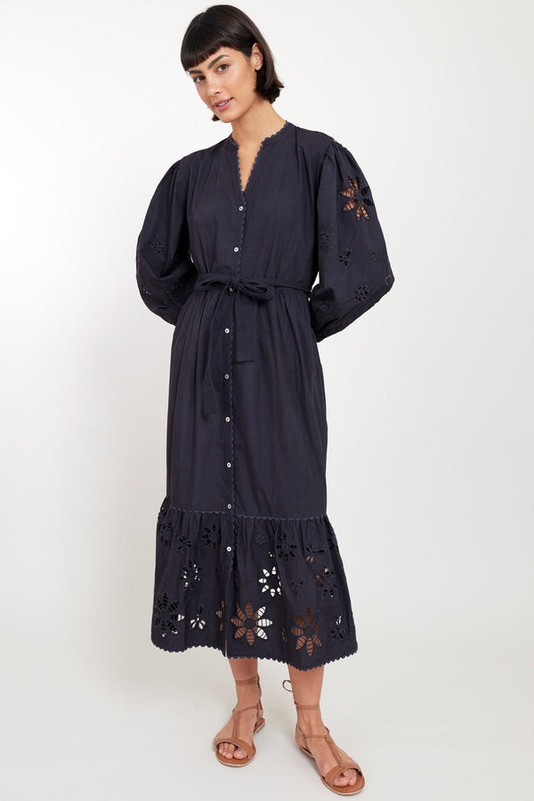 Model wears East Harlow Black Organic Cotton Embroidered Dress