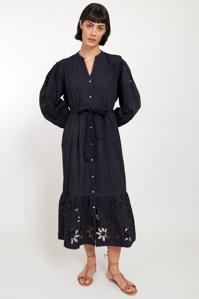 Model wears East Harlow Black Organic Cotton Embroidered Dress