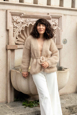 Beige mohair cardigan with knitted belt. Oversized fit, handmade out of premium Italian yarn. Worldwide shipping.