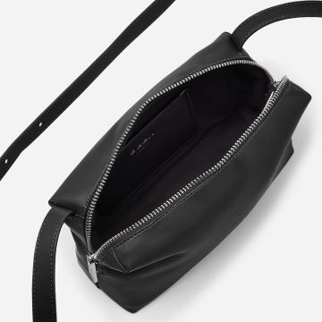 Interior of Rees Smooth Grain Recycled Leather Camera Bag in Black Onyx showing handy internal pocket
