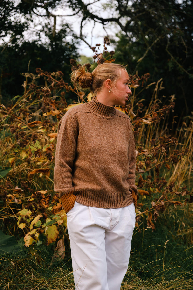 Maree knit is made with the finest Scottish spun lambswool. Knitted in a chunky luxurious 4 ply yarn with a funnel neck, contrast cuffs and a boxy, oversize fit. Traditionally made with fully fashioned knitting techniques and linked together by hand. Crafted within 80 miles of our design studio in the Scottish Borders.